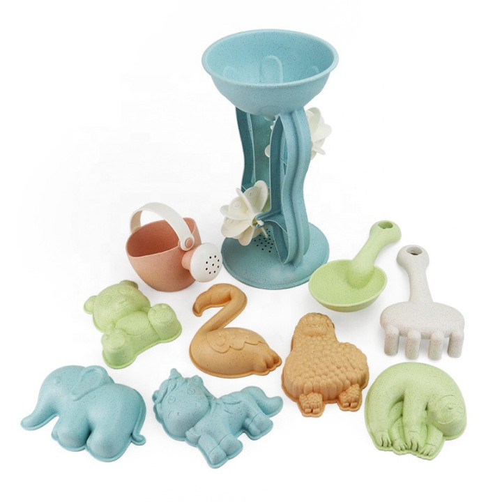 WOOPIE GREEN Sand Set with Spinning Wheel and Watering Can 10 pcs. BIODEGRADABLE ORGANIC MATERIAL