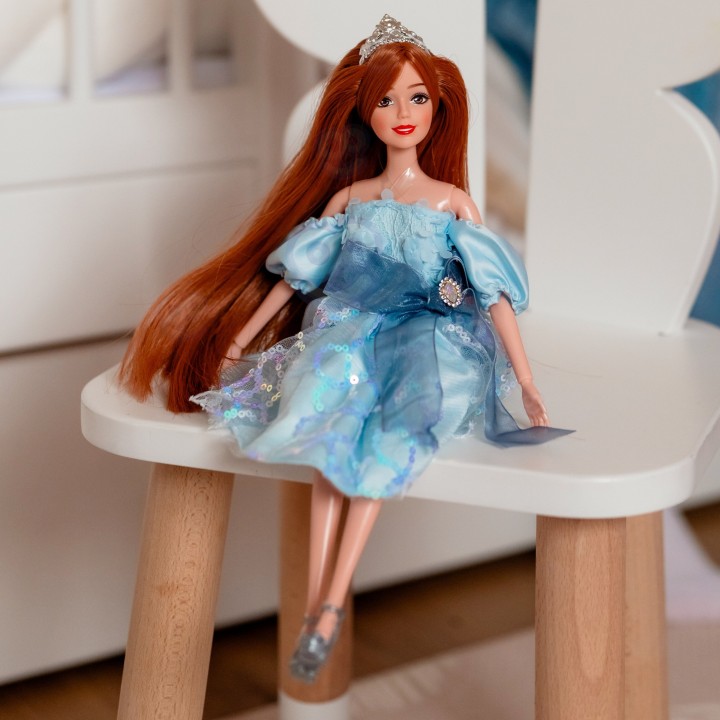 Emi doll in a blue dress - an elegant doll for girls Woopie