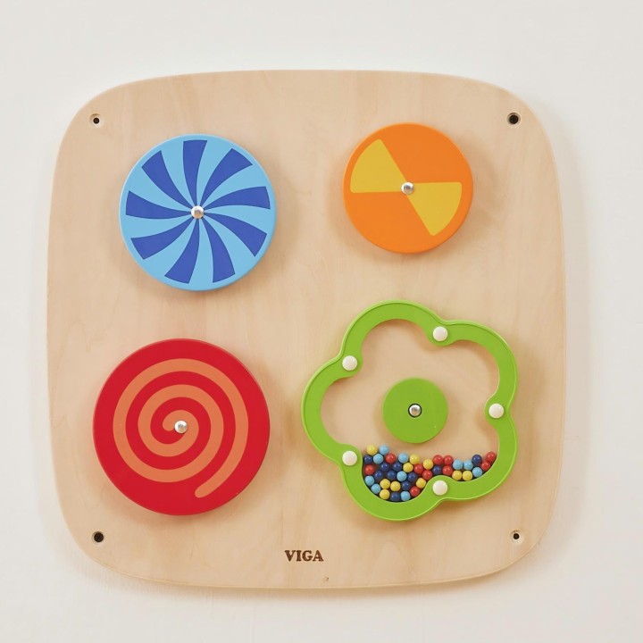 Wall panel with rotating discs and illusions for children – Viga