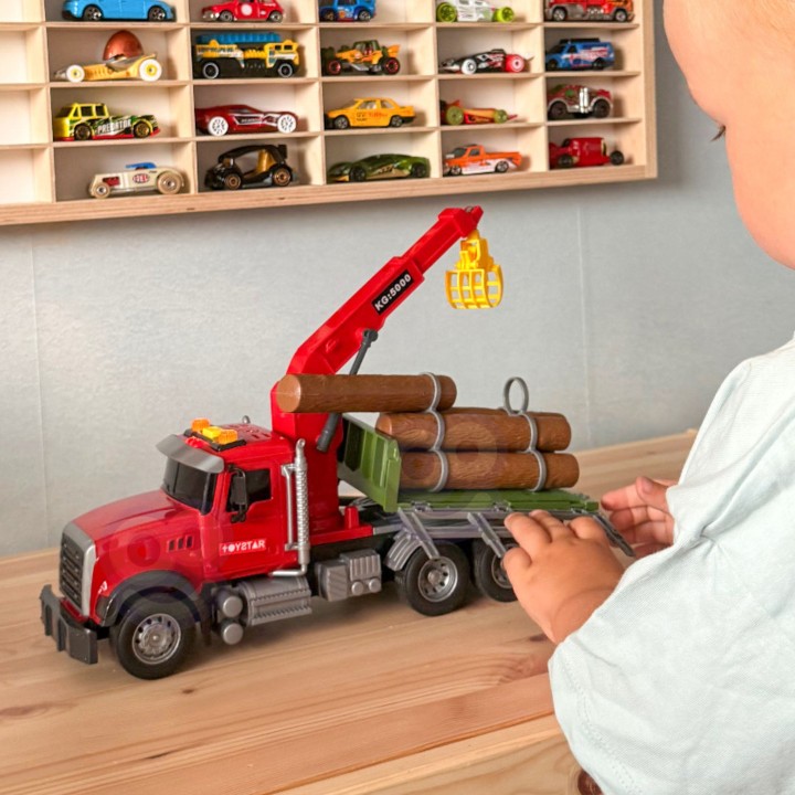Truck with a moving crane and timber - an interactive toy by Woopie