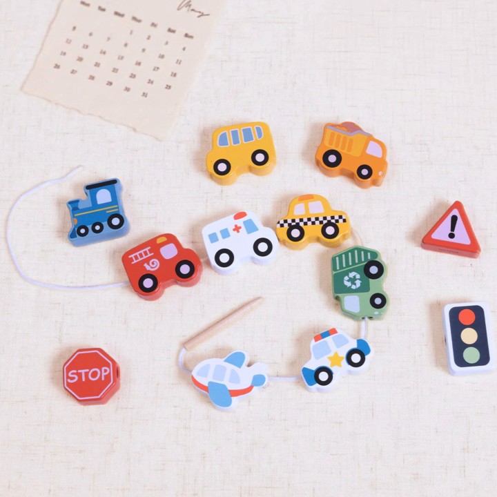Wooden threading toy Transport Woopie Green - 13 pcs.