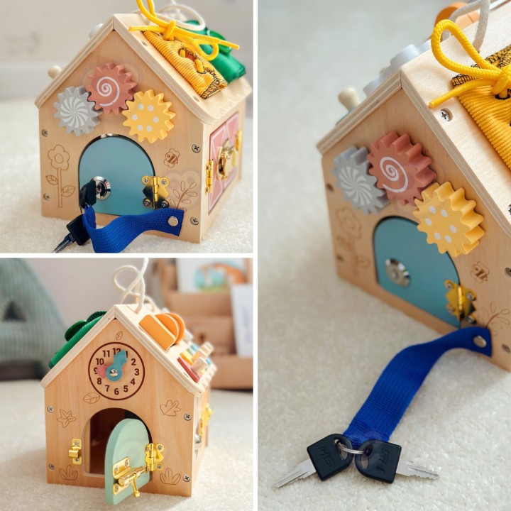 Drewniany domek manipulacyjny TOOKY TOY - zabawka z zamkami